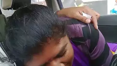 Telugu woman gives a desi blowjob to her man in a car